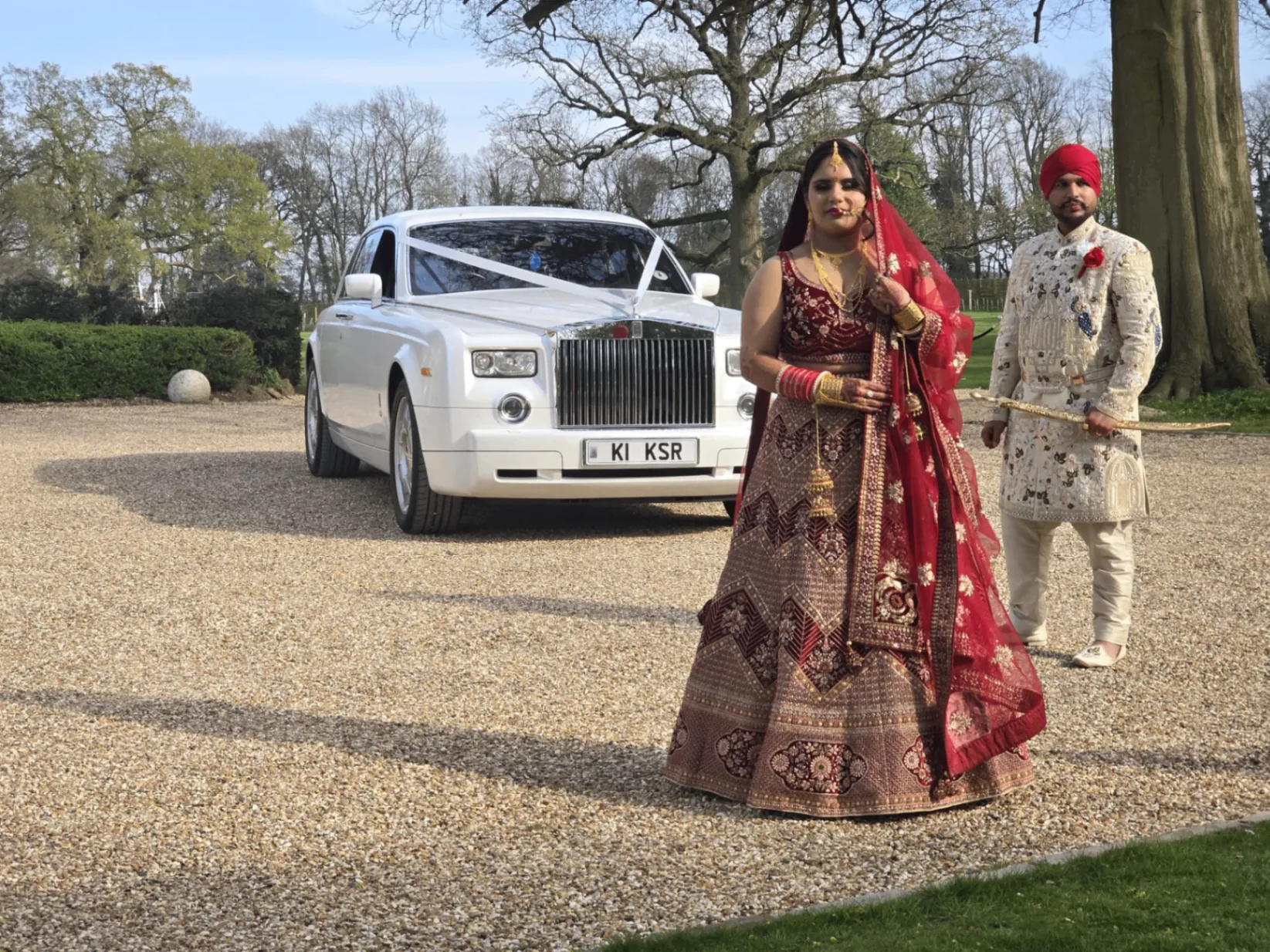 Bride and groom in traditional Asian wedding attire during the celebrations
