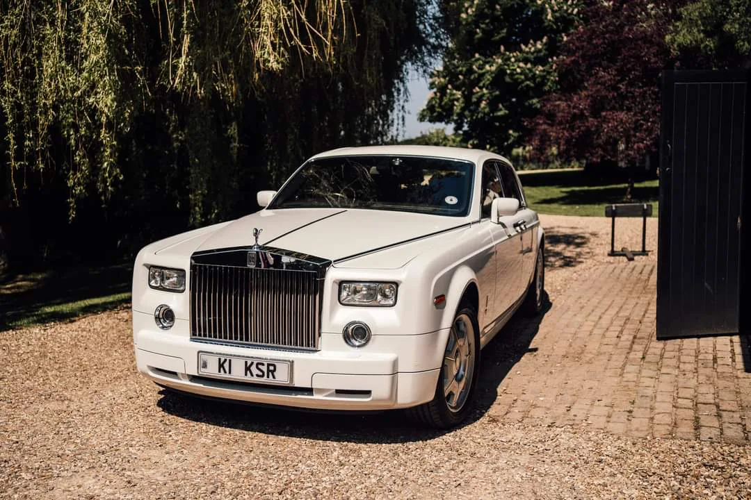 Choosing the Right Wedding Car with a chauffeur-driven White 7 car prepared for the occasion