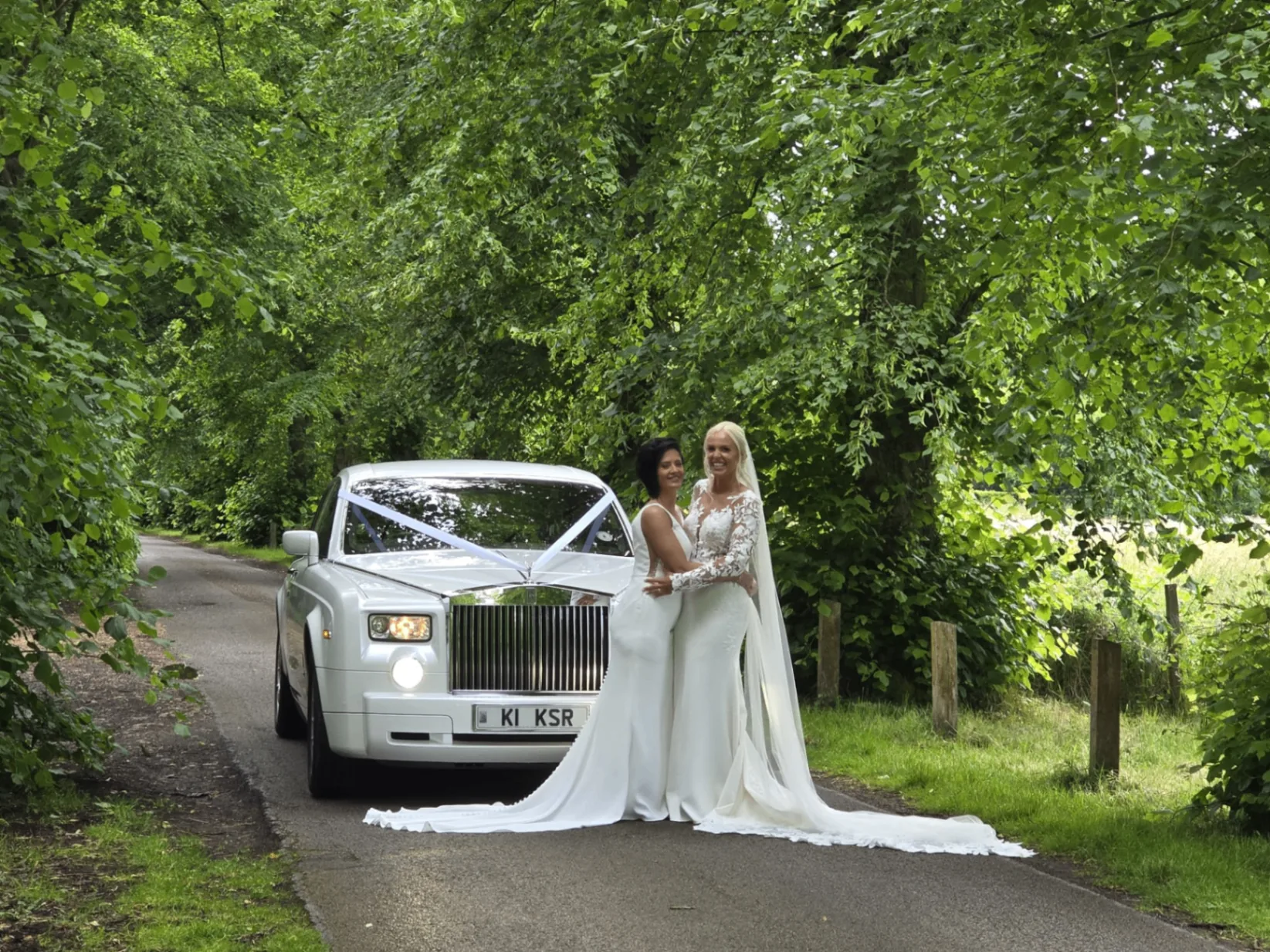 Bride and groom with the Rolls-Royce Phantom